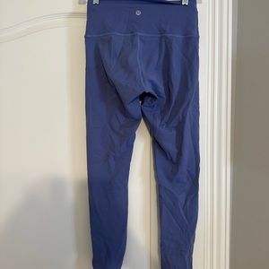 Winder under blue leggings